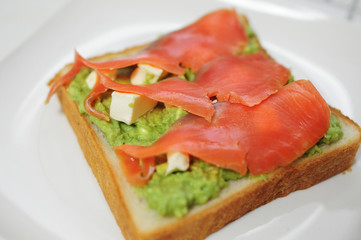 Salmon, avocado and cream cheese sandwich