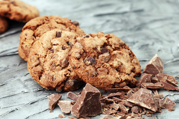 Chocolate cookies on wooden table. Chocolate chip cookies shot