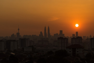 Fototapeta na wymiar Majestic sunset over downtown Kuala Lumpur, Malaysia