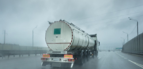 Large tanker truck rolling on highway