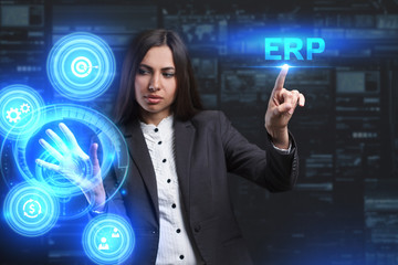 The concept of business, technology, the Internet and the network. A young entrepreneur working on a virtual screen of the future and sees the inscription: ERP