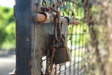 Old door bolt and chain with lock