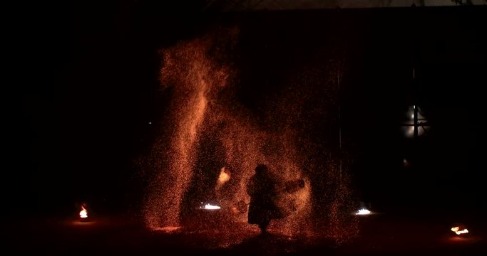 Fire Show Artist Juggling Fire at the Festival