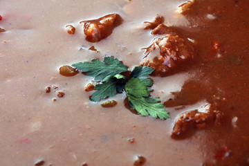 Tasty Hungarian beef goulash soup bograch close-up on the table and ingredient