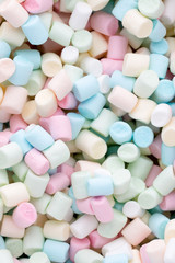Background or texture of colorful mini marshmallows.
