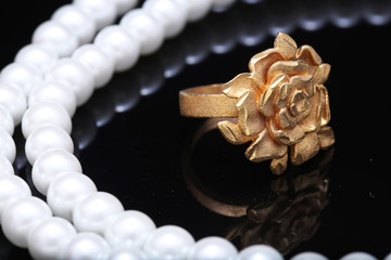 gold rose ring and pearl