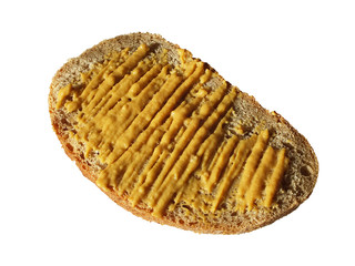 mustard on bread /  piece of bread isolated on white