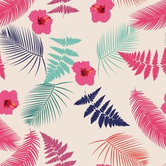 Seamless pattern on a tropical theme. Fern, leaves of palm trees, hibiscus flower. Vector.