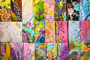 Various design of batik painting hanging in craft shop in Kuala Terengganu, Malaysia.