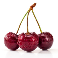 Delicious juicy ripe cherry on a white background