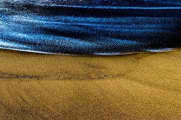 A new kind of blue textured in a beach