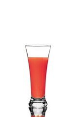 tomato juice in glass with mirror reflection on white background, isolated