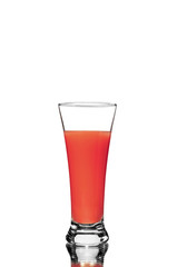 tomato juice in glass with mirror reflection on white background, isolated