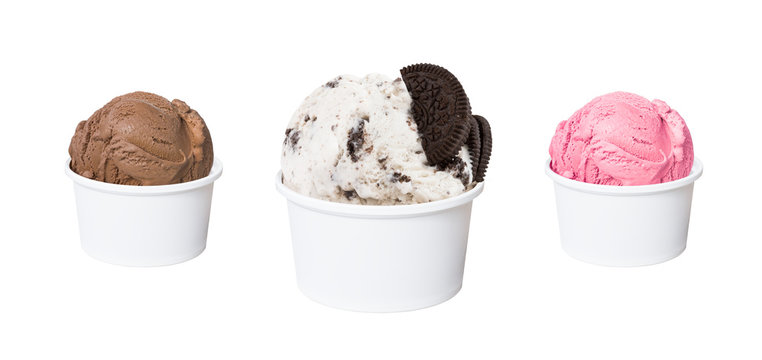 Ice cream scoops in white cups of chocolate, cookies and cream, and strawberry flavours isolated on white background (clipping path included)