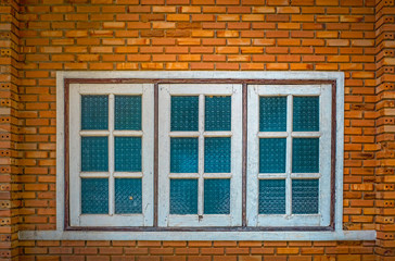 Old wooden window at old town,Windows of an old stone house