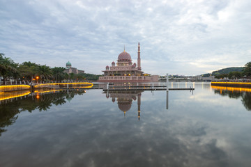 Sunrise moment at Putra Mosque, a principal mosque of Putrajaya, Malaysia. Construction of the mosque began in 1997 and was completed two years later.