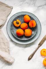 Delicious apricots on the table close-up. 
