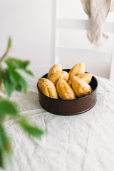 Pies house with cheese and sesame, fried in hot fan