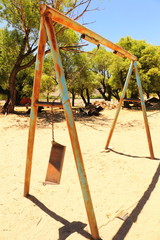 Rusty broken swing