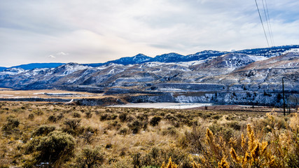 Thompson River flowing through semi desert landscape of the Thompson River Valley viewed from...