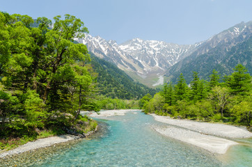 Hotaka mountain range and azusa river in spring at kamikochi national park nagano japan