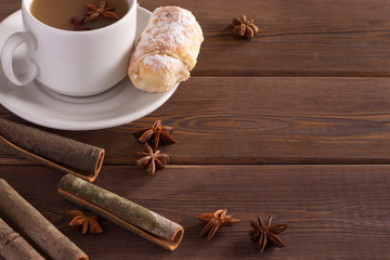indian tea masala white cap spices on wooden background
