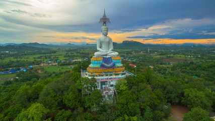 Fototapeta na wymiar sunset at big Buddha of Wat Nong Hoi