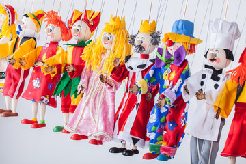Fototapeta premium The raw of different puppets