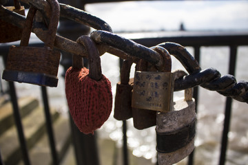 Padlocks on a railing at Liverpool's Albert Dock