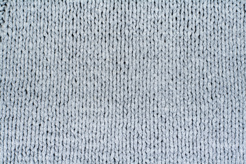 Pattern of the Knitted Fabric Texture. Woolen background.