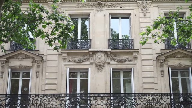 establishing shot of traditional residential building in Paris, close up