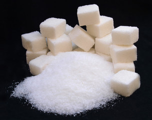 sugar over black background