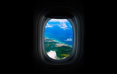 Costline, sea and sky from the plane's window © SharlottaU