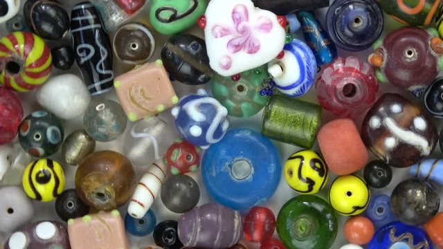 Beautiful various vintage indian glass beads from India rotating background