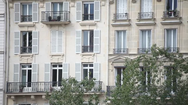 establishing shot of residential apartment building in Paris