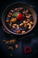 Dessert mystical light chocolate pudding nuts strawberry