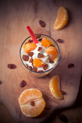 Fresh fruit mandarin yoghurt and raisins