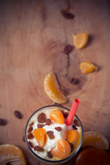 Fresh fruit mandarin yoghurt and raisins