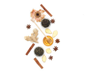 Healthy honey, herbs, tea, ginger and anise over white background. Flat lay, top view, copy space