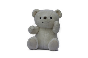 White teddy bear sitting isolated on white background