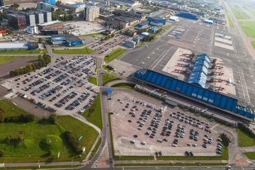 Papier Peint photo Aéroport TALLINN, ESTONIA - AUGUST, 15, 2016: Aerial view of airport terminal and gates with suburbs