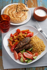 Kebabs with bulgur and vegetables