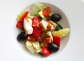 Greek salad/ Greek salad in a white plate