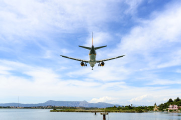Fototapeta na wymiar Passenger plane landed at the airport in Kerkyra, Corfu island in Greece.