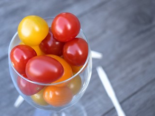 Tomato cocktail in a wine glass.