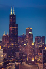 Fototapeta na wymiar Chicago Downtown skyscrapers at dusk, aerial helicopter view, United States