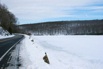 Frozen lake and snow at Seven Lakes Drive, on winter, New York