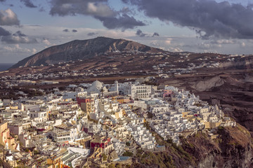 Sunset over Fira, town on the cliff, Santorini Island, Greece