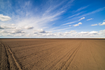 Agricultural landscape, arable crop field. Arable land is the land under temporary agricultural crops capable of being ploughed and used to grow crops.