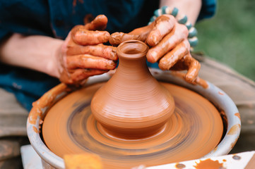 hands of a Potter at work